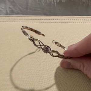 Ronaldo - One Day at a Time. Gold/silver with pink topaz center stone